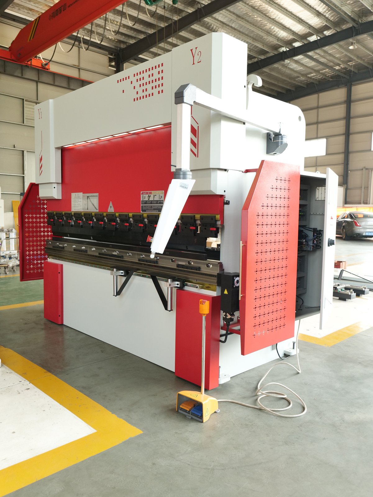 ZTGAOKE custom 100T 2800mm CNC press brake in red and white - side view in the assembly workshop